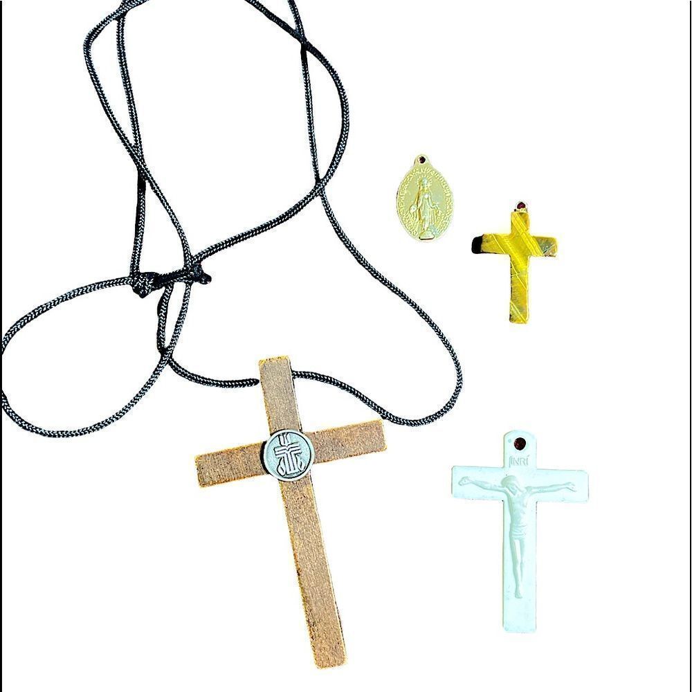 Collection of four  Christian Pendants - wood, tigers eye, gold tone